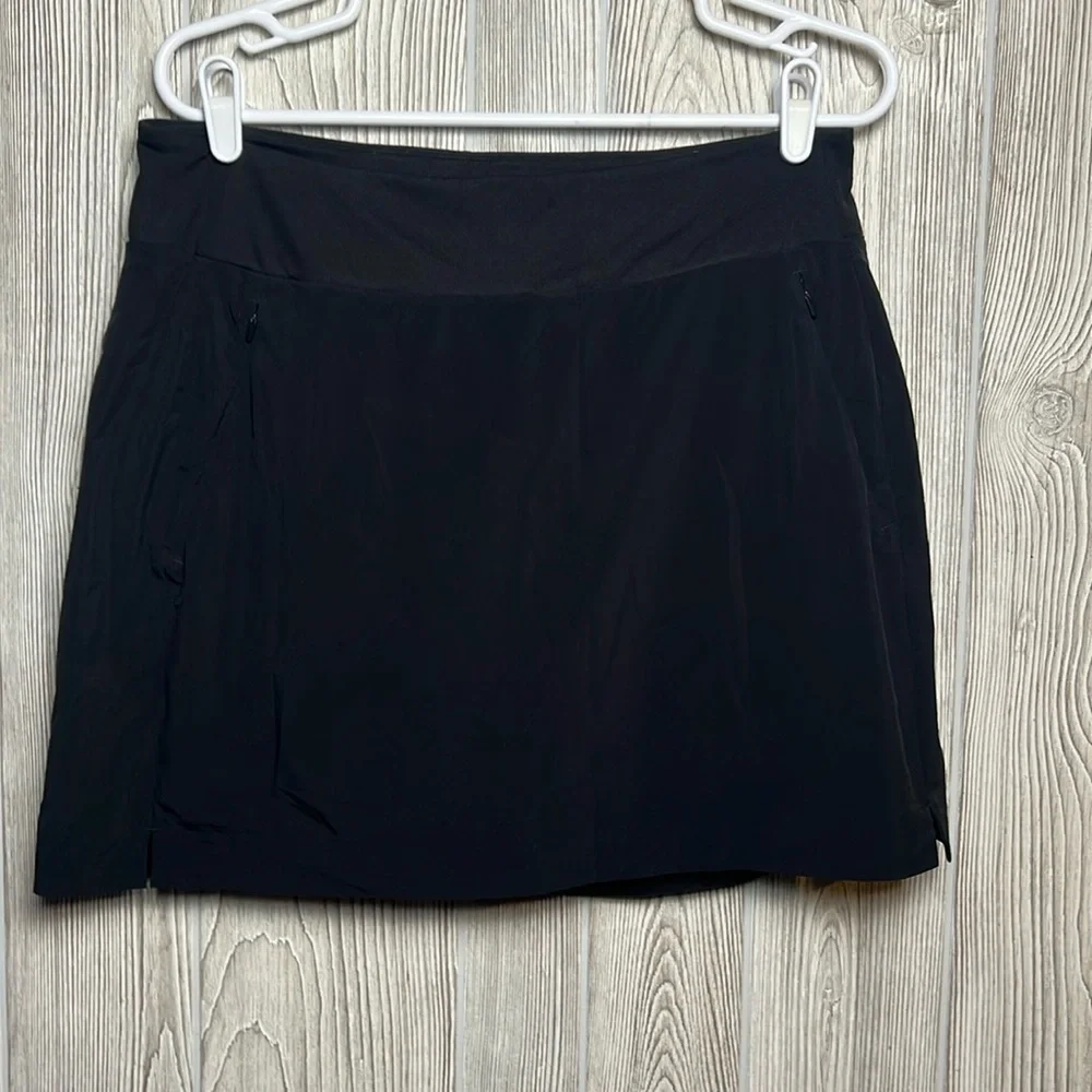 Athleta Black Soho Skort UPF 50 Stretch Womens Size 12 Black Zip Pockets Lined